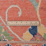 Wool pile close-up of orange & blue Kazak-inspired wool rug 29636.