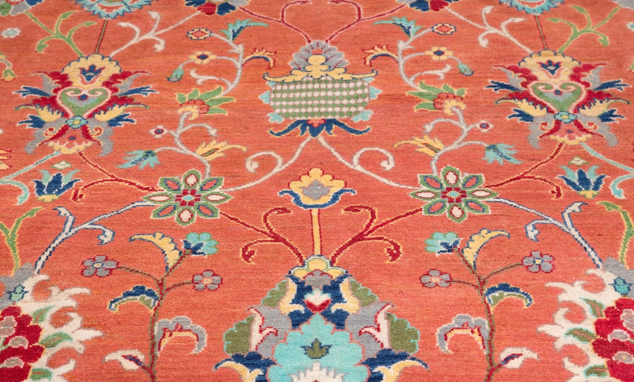 Pattern detail of orange & blue Kazak-inspired wool rug 29636.