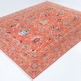 Full view at an angle of orange & blue Kazak-inspired wool rug 29636.