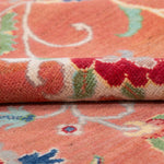 Folded edge and wool pile of orange & blue Kazak-inspired wool rug 29636.