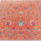 Full view from a low angle of orange & blue Kazak-inspired wool rug 29636.