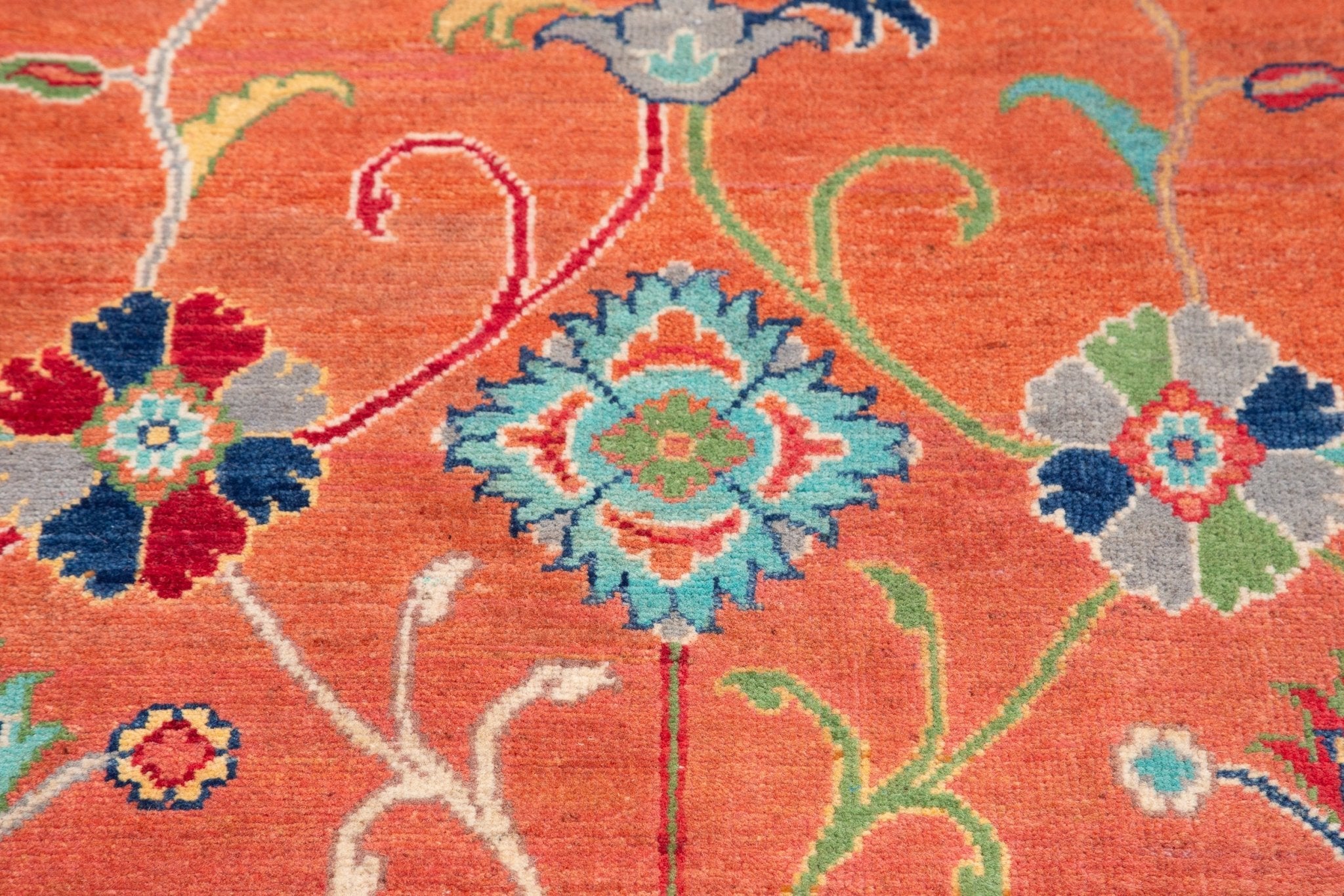 Pattern detail of orange & blue Kazak-inspired wool rug 29636.