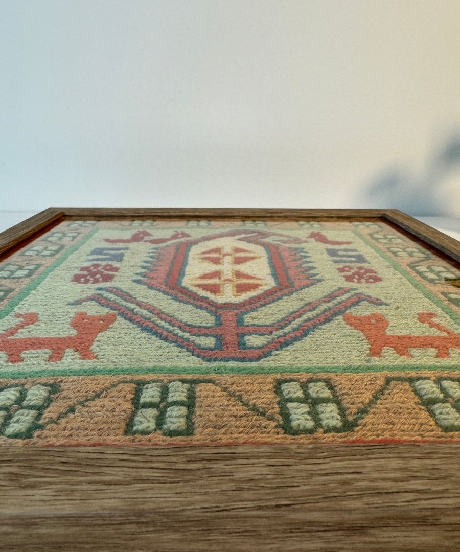 Framed kilim rug, mint green with orange terracotta accents and central geometric cross