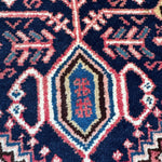 Persian Abadeh rug with navy field and pink-blue geometric medallion motif