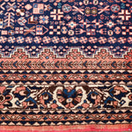 Persian Abadeh rug border with repeating zigzags and floral accents in navy