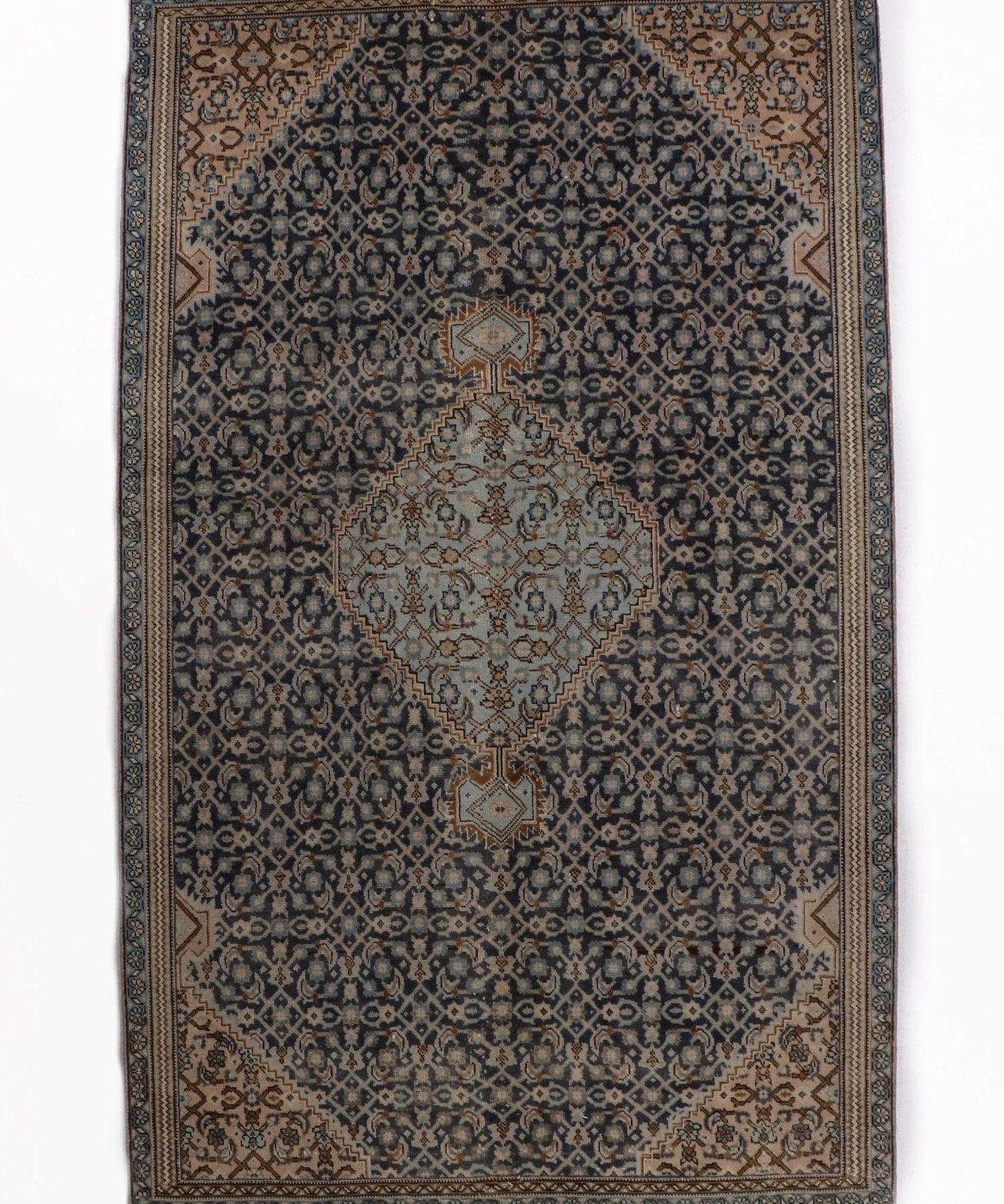Persian Ardabil rug with navy, gray, and tan medallion pattern border