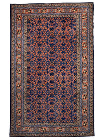 Persian Ardabil rug with navy-blue geometric design, rust border, and cream inner frame