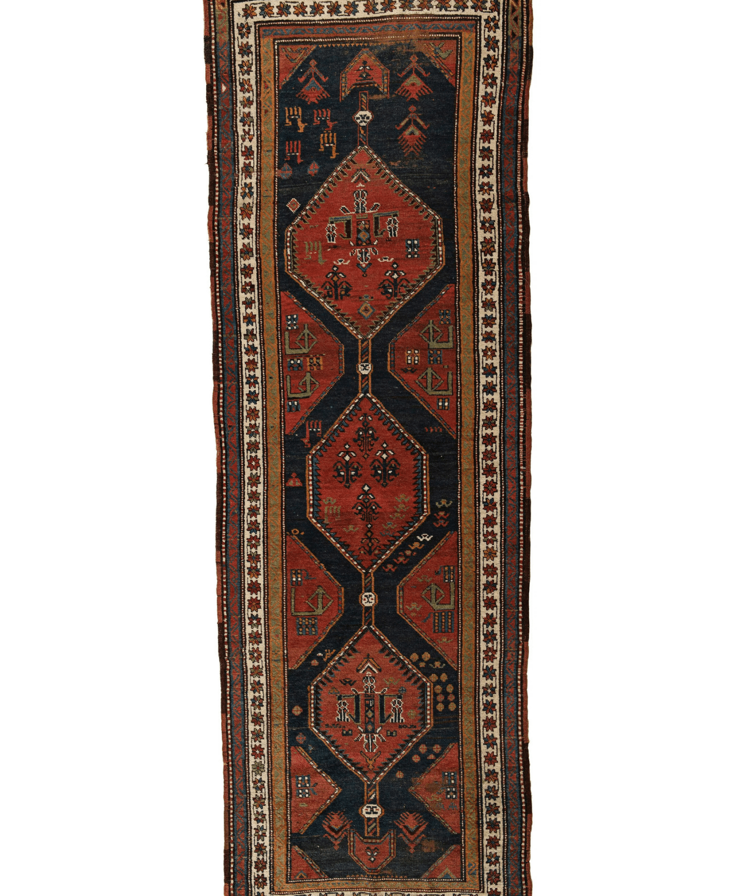 Persian runner rug with dark navy field, rust red medallions, and ornate border