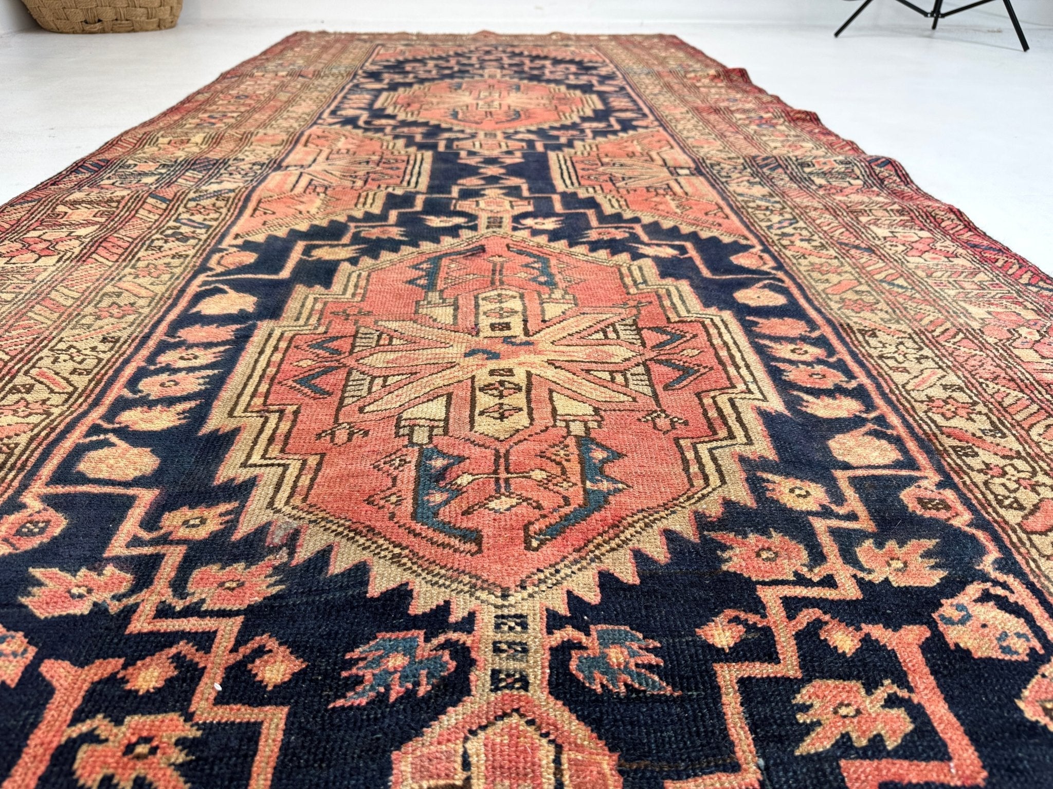 Persian Azerbaijani runner rug featuring a central medallion in navy, rust, and tan