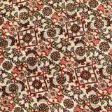 Persian Bidjar rug texture close-up with cream background and red-orange geometric motifs.