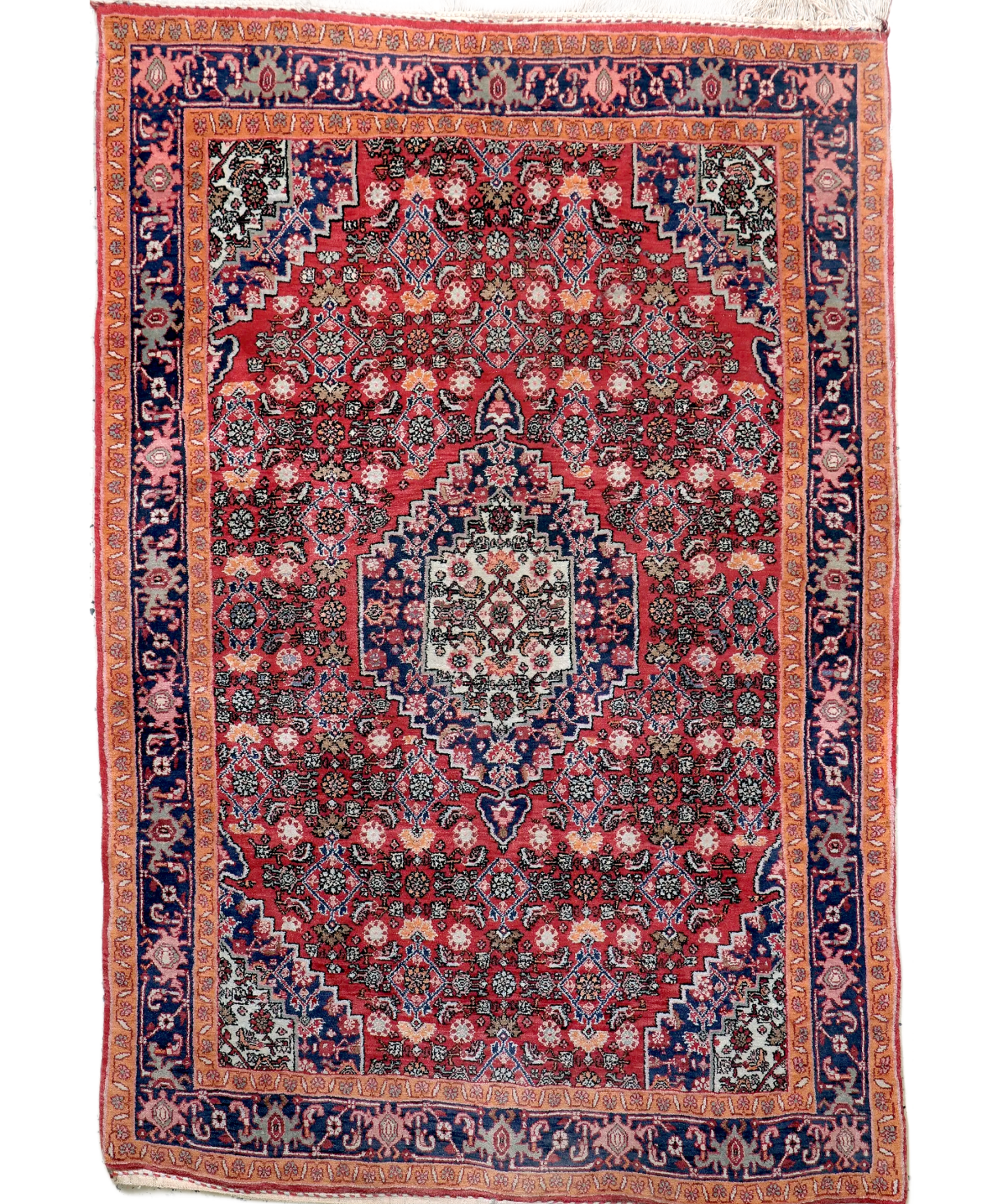 Persian Bijar rug with red field, blue border, and central medallion pattern