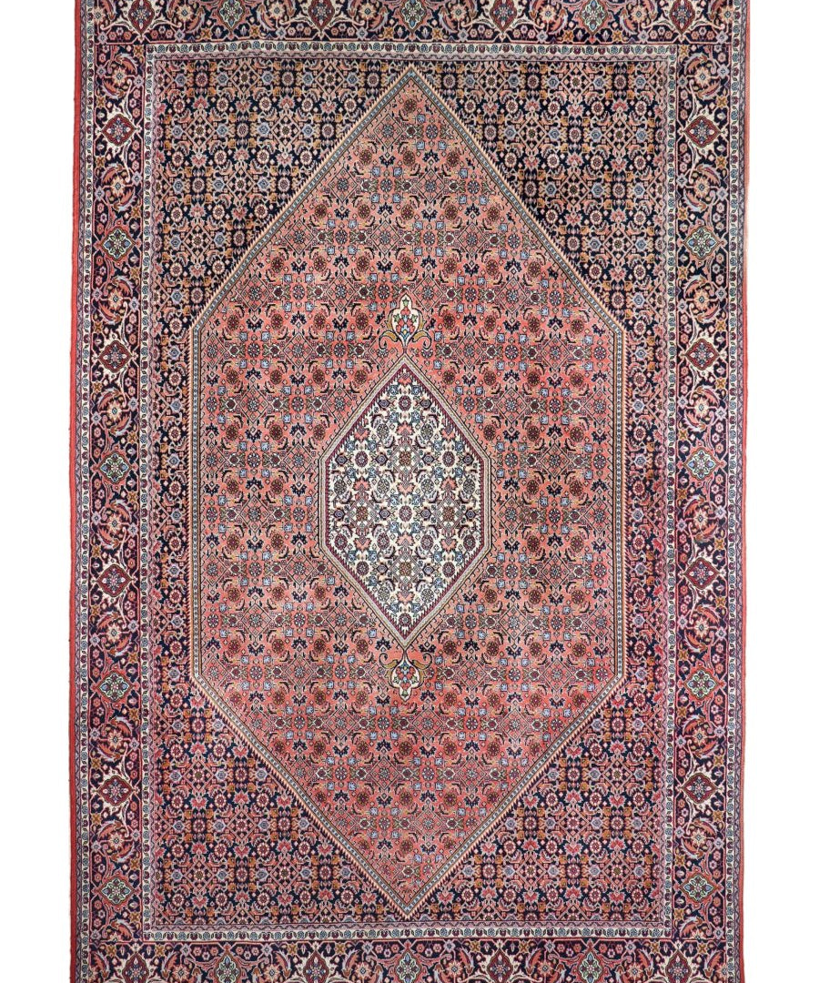 Persian Bijar area rug with rust-red and navy medallion, geometric border, dark pile