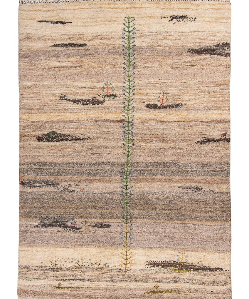 Persian Gabbeh rug on white: beige field with gray bands, tall green-blue center pattern, fringe