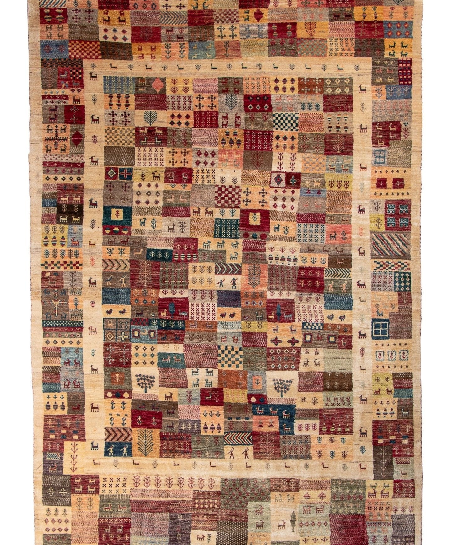Persian Gabbeh-style area rug with multicolor square patchwork pattern on light background