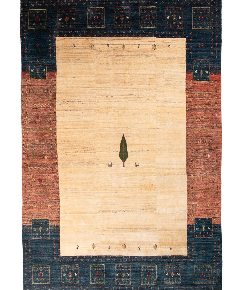 Persian Gabbeh rug with beige center, small tree motif, and blue red border