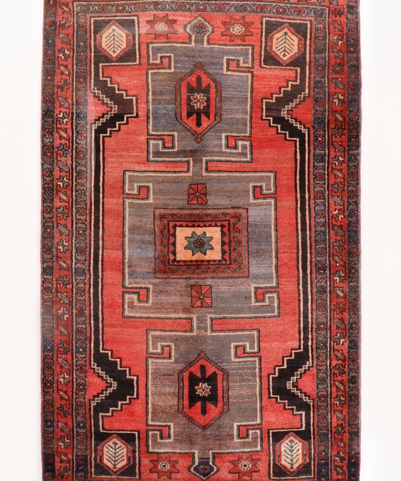 Persian Hamadan rug full view with red background and gray geometric framework