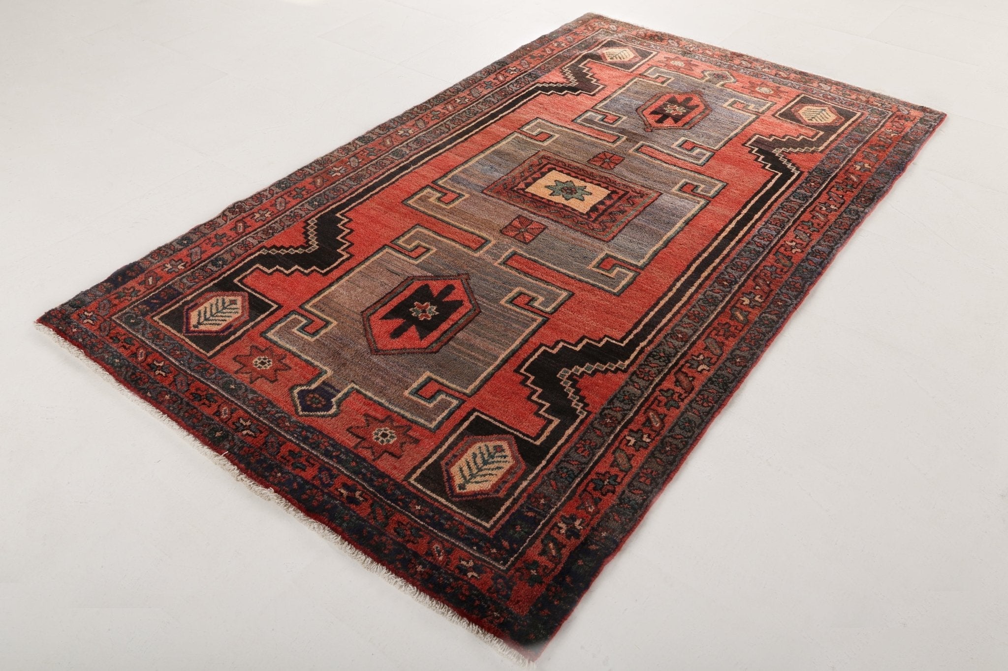 Persian Hamadan rug with red, gray, black geometric medallion and border design