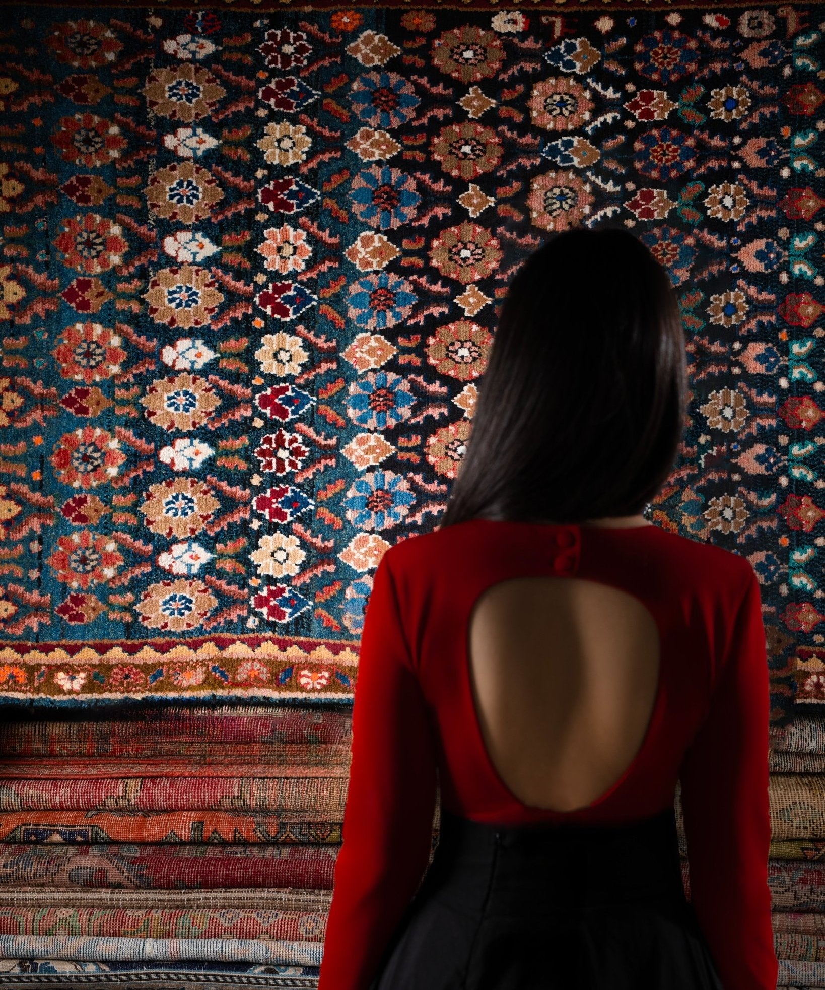 Persian Hamadan runner rug underfoot with navy medallion pattern and detailed red border