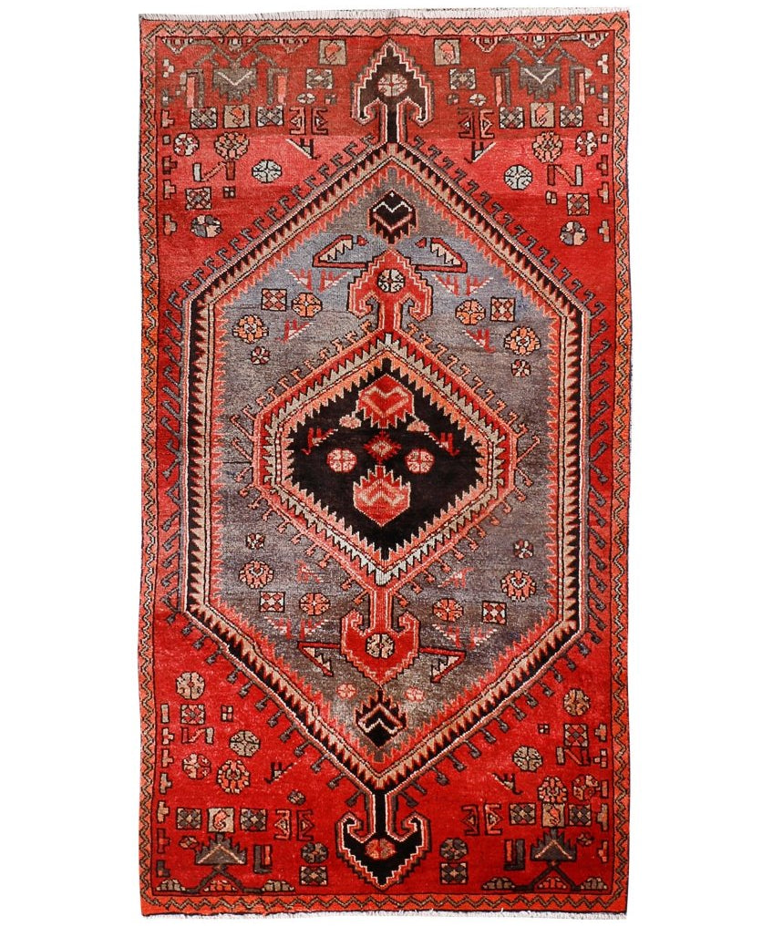 Persian Zanjan rug with red border, gray field, and black-and-red diamond medallion
