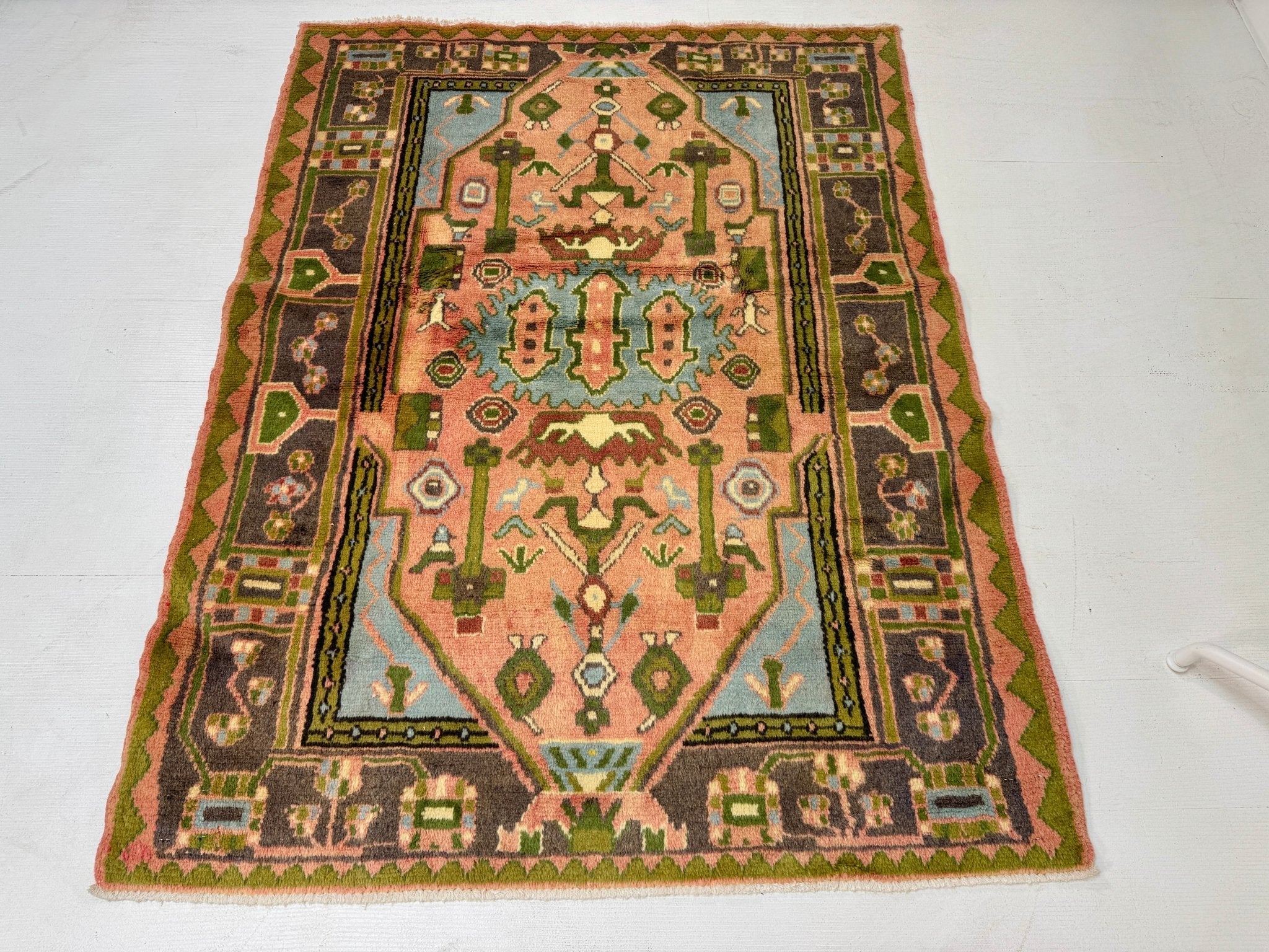 Persian Jozan rug with geometric medallion center and border in rust, green, navy, and beige