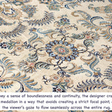 Persian Kashan rug with cream field and blue scrolling vine motifs with central rosette