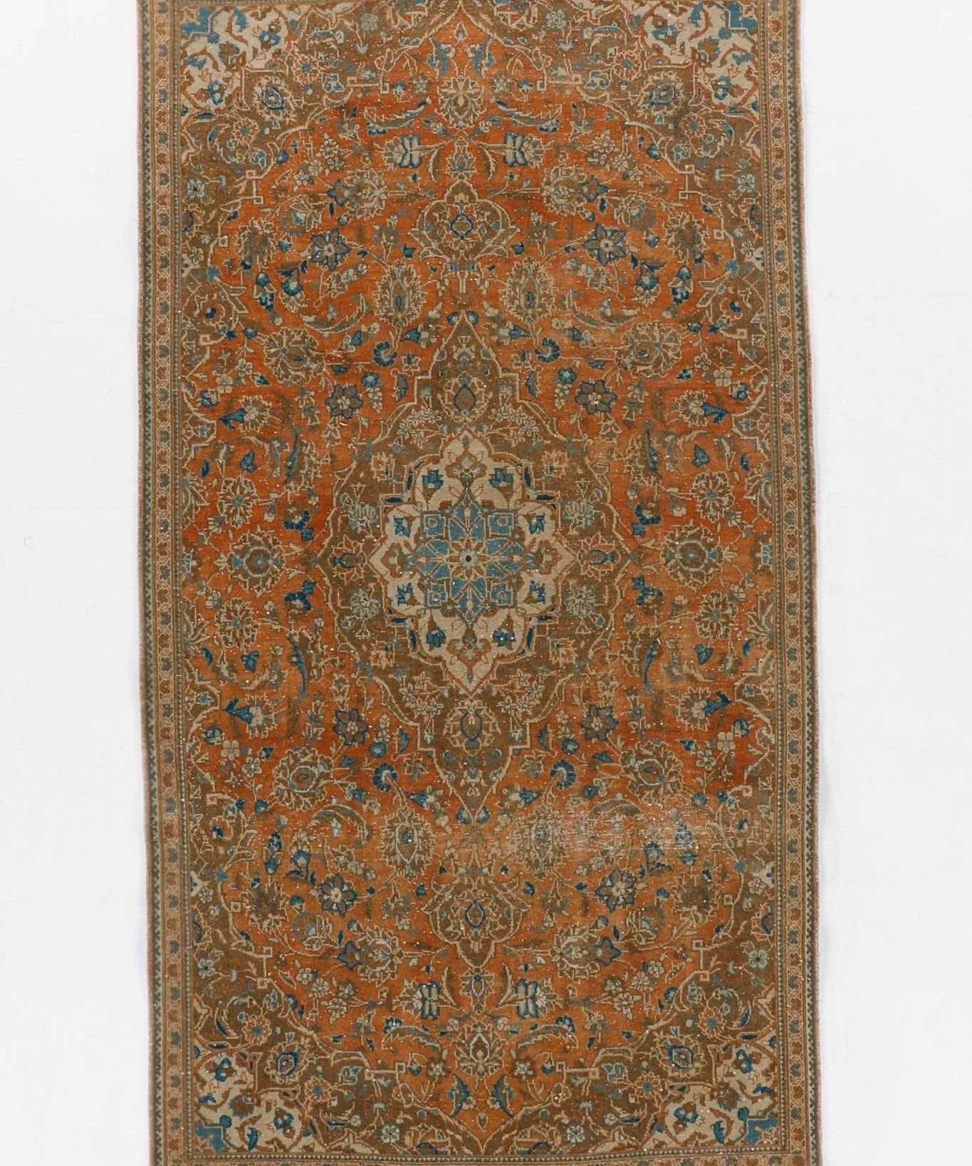 Persian Kashan rug, rectangular rust and teal floral pattern with central medallion, border
