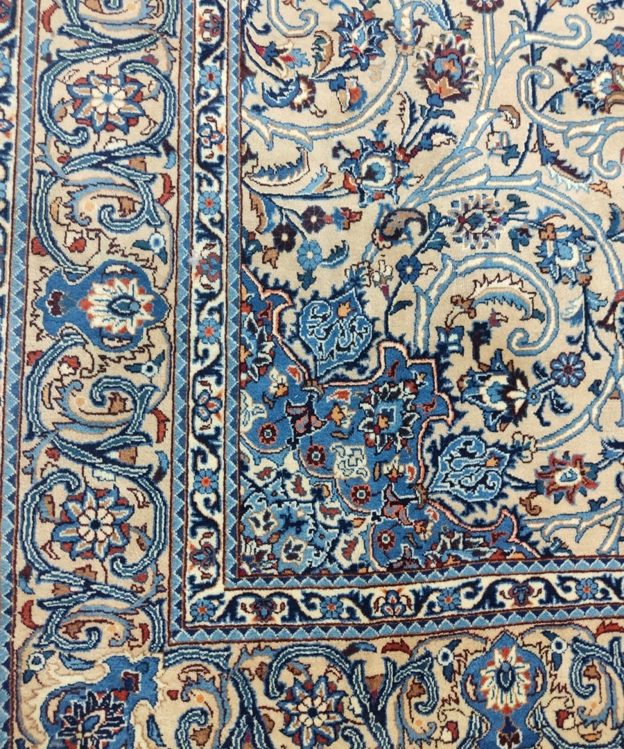 Persian Kashmar rug detail, blue and cream floral scrollwork panel