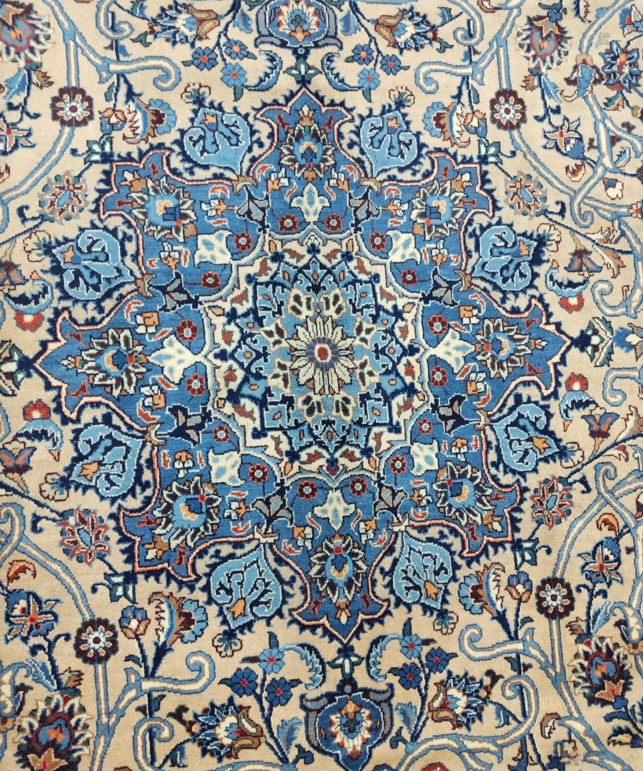 Persian Kashmar rug pattern, dense blue and cream floral rosette field