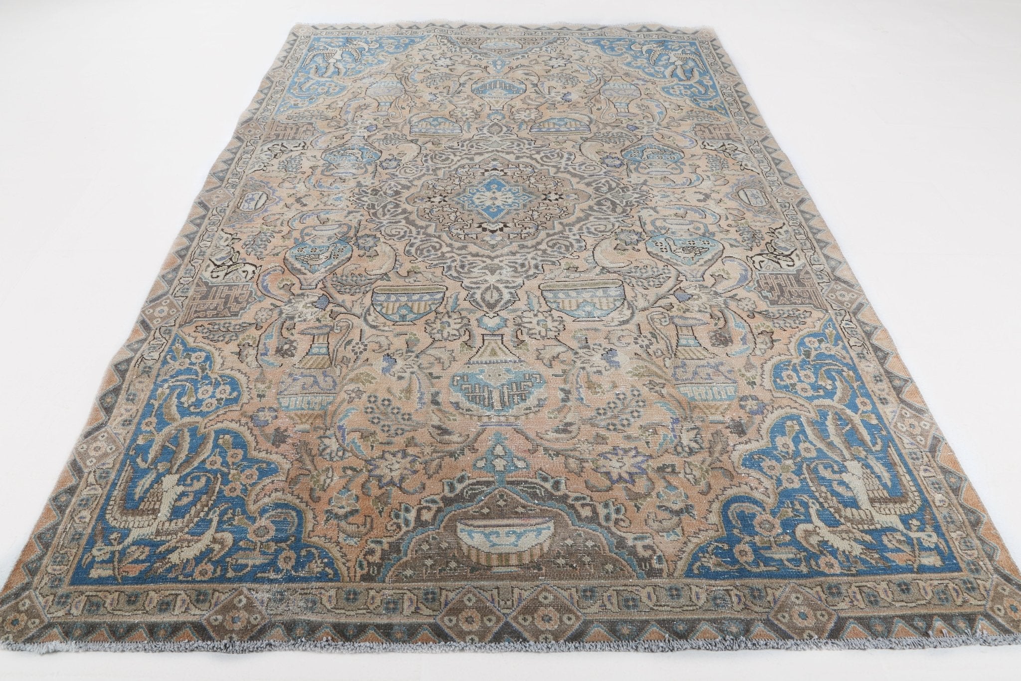 Persian Kashmar rug with blue central medallion on beige, ornate allover pattern