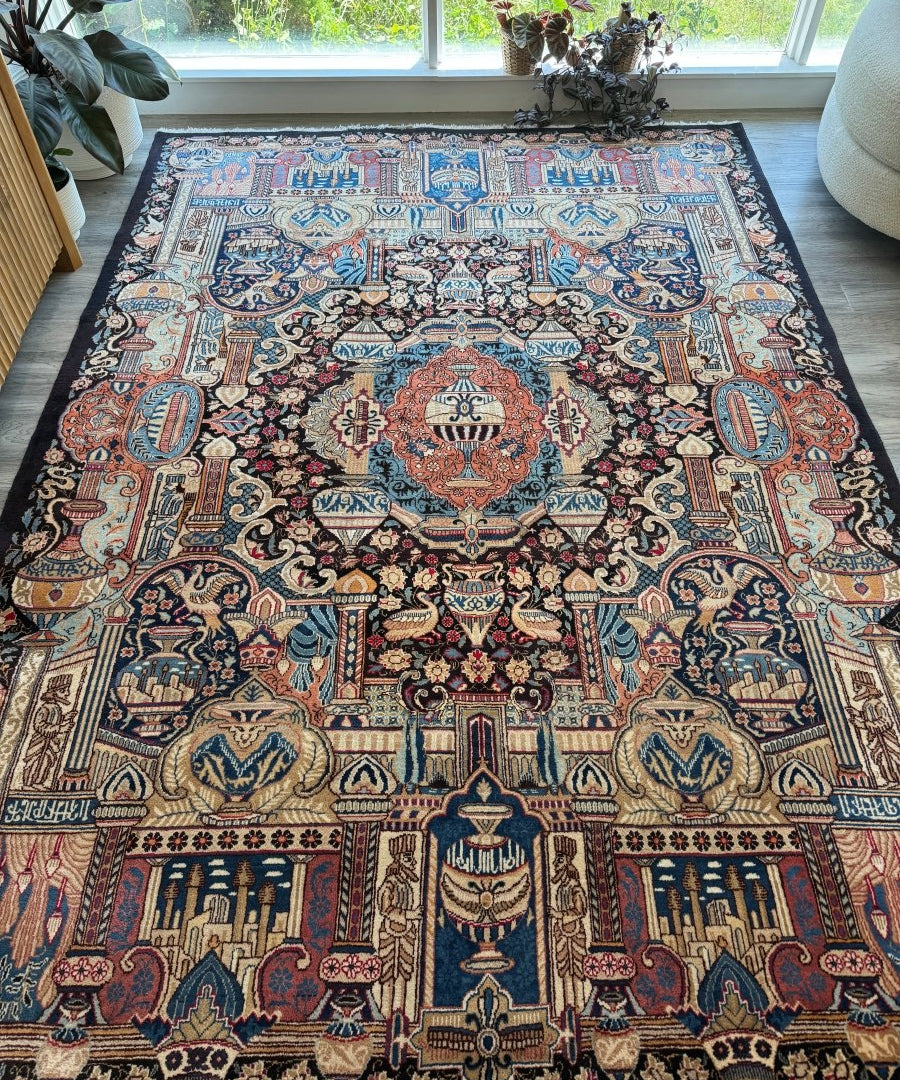 Persian Kashmar rug with blue, rust, and cream medallion pattern and border motifs