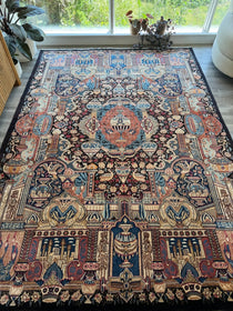 Persian Kashmar rug with blue, rust, and cream medallion pattern and border motifs