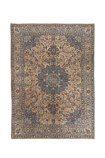 Full Persian-style rug in blue, beige, and orange with ornate central medallion border