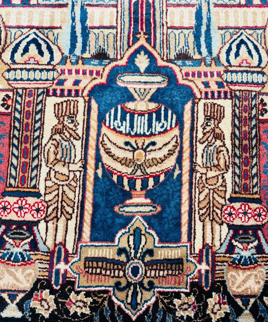 Persian Kashmar rug close-up of column and vase motifs in cream, blue, and red