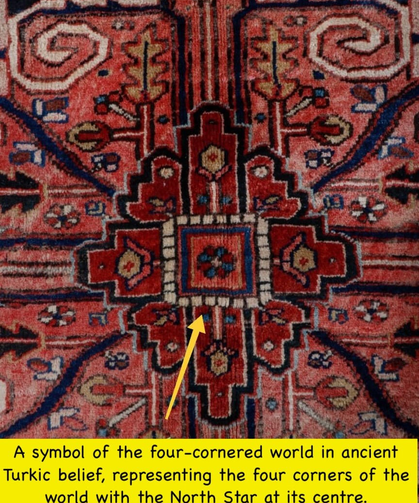 Persian Heriz-style rug close-up of symmetrical central medallion with cross motif