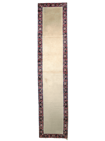 Cream runner rug end view with dark blue border and red ornamental pattern