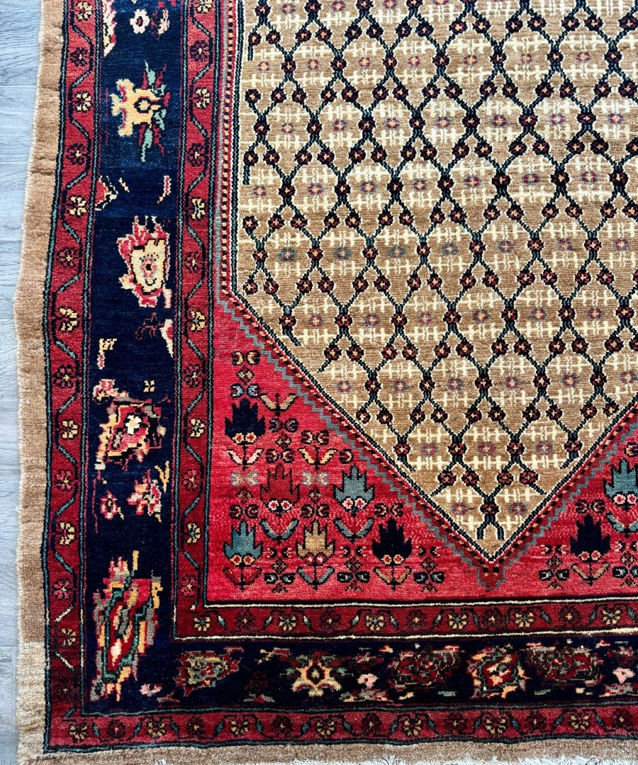 Persian Koliai rug, red and navy medallion border with cream lattice pattern