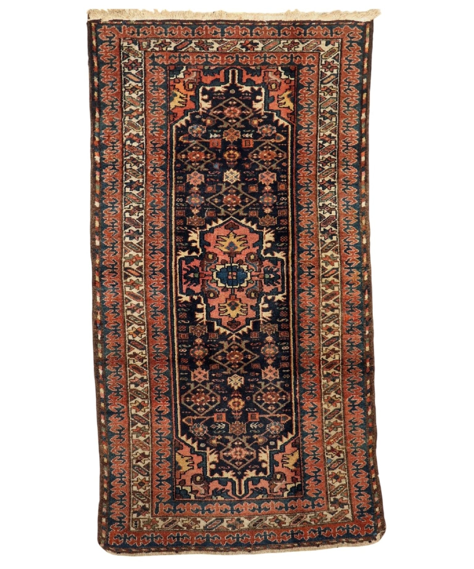 Persian Kurdi rug with dark navy center and rust, cream, and blue border patterns