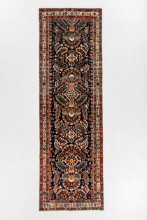 Persian Lilihan runner rug with ornate central medallions and multicolor border
