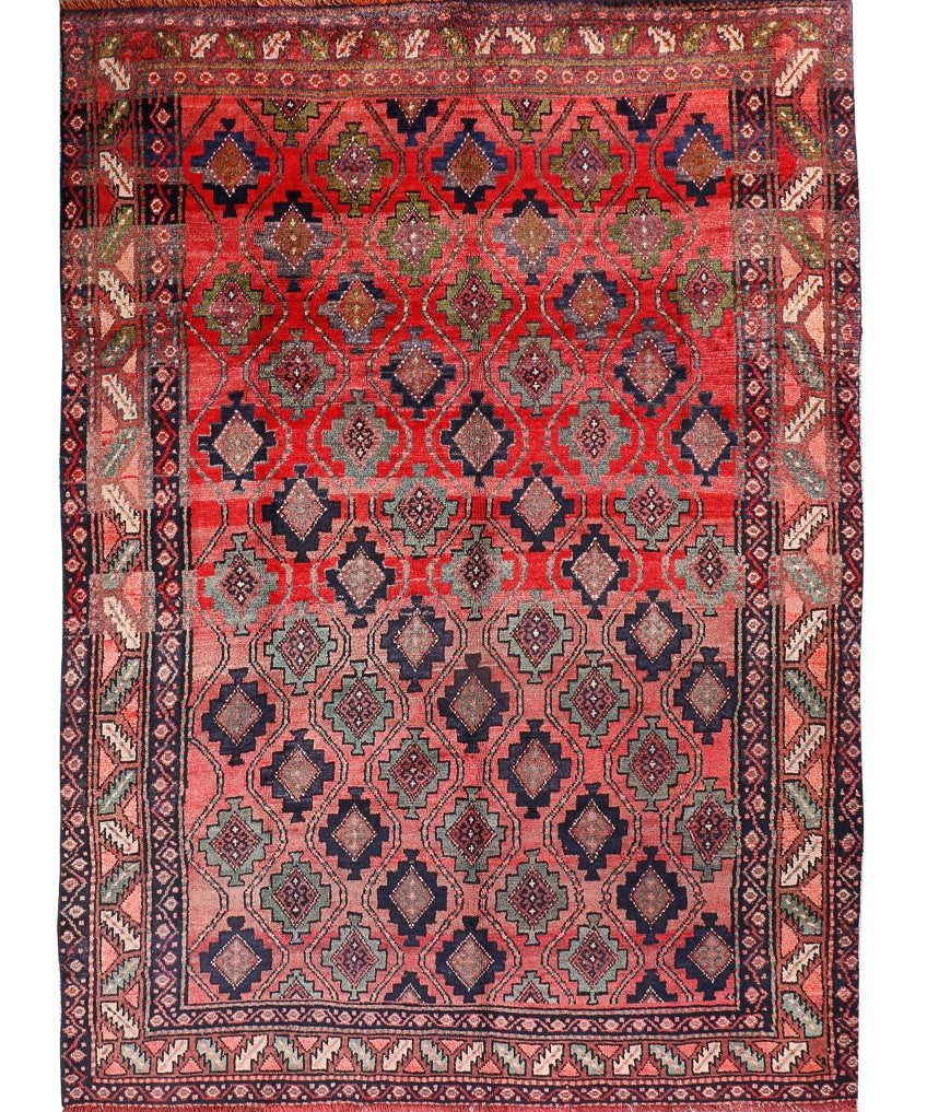 Persian Lori rug with red field, navy and green diamond motifs, border, flat weave.
