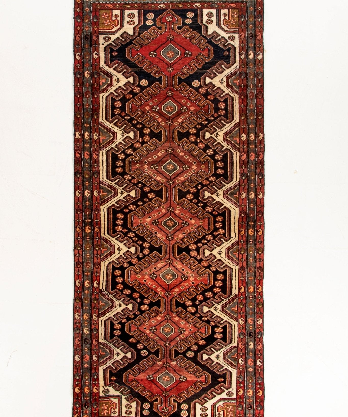 Persian Luri runner rug with red geometric medallion pattern and border, 3'10"x9'6"