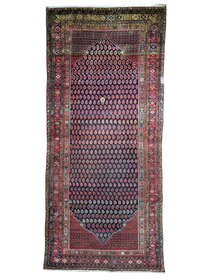 Rectangular Malayer rug with navy, red, and blue geometric medallion border