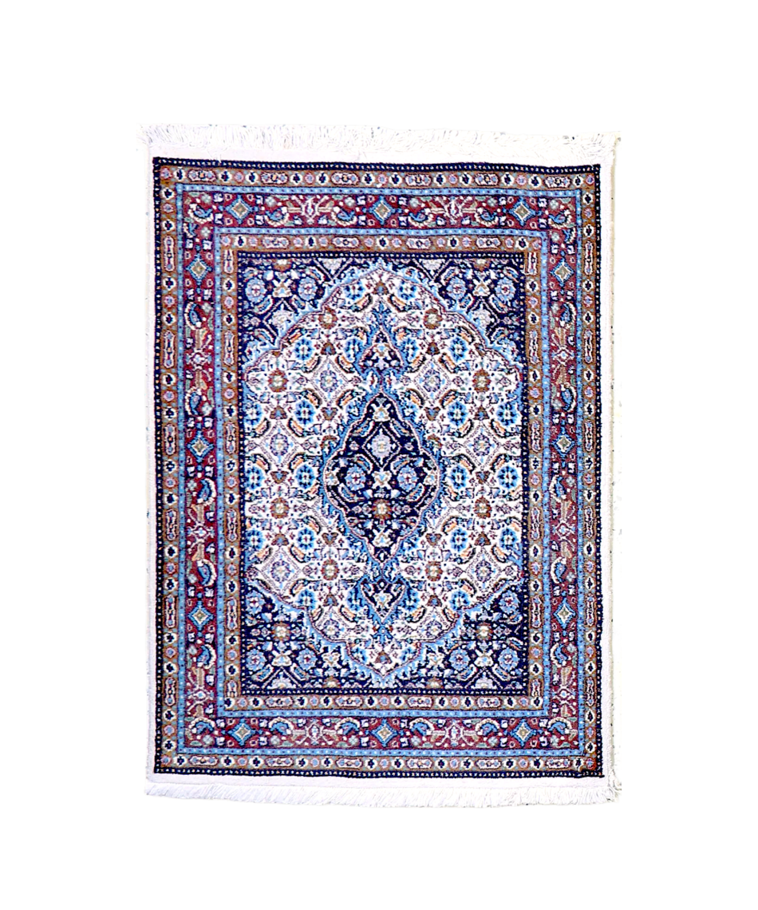 Moud rug centered with blue and white medallion, ornate frame border, and fringed corners
