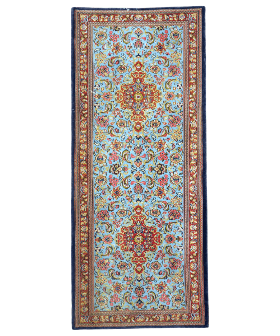 Persian wool runner rug with light blue medallions, multicolor accents, and red frame