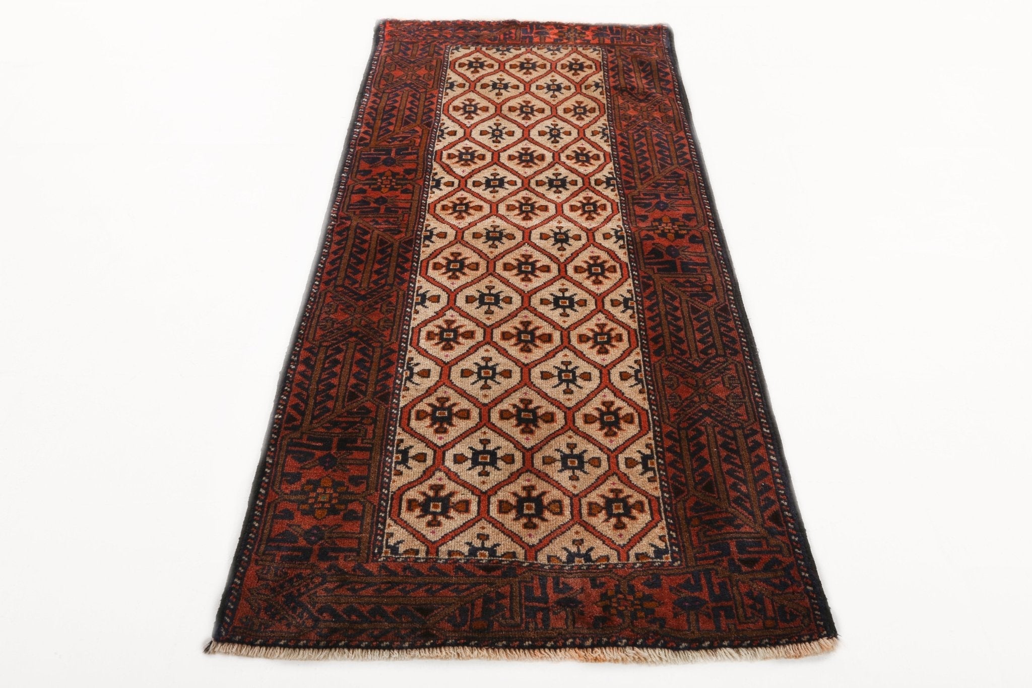 Persian rug shown straight-on; beige center, terracotta sides, dark navy ornamental borders