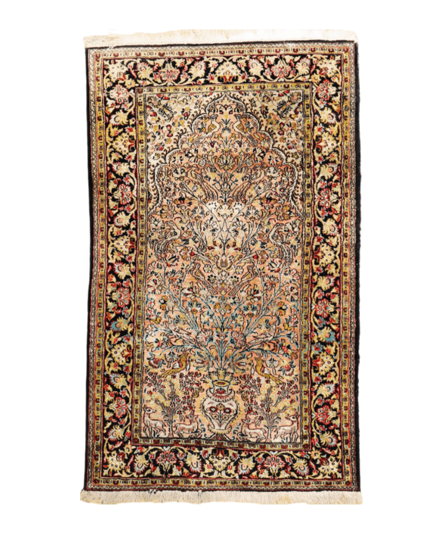 Persian Qum silk rug full view with beige field, black border, and fringed ends