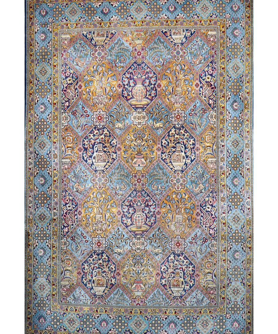 Persian Qum rug full view with turquoise background, ornate medallions, and multicolor border