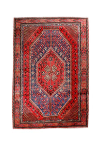 Persian Shahreh-Babak rug with red, blue and cream geometric medallion design