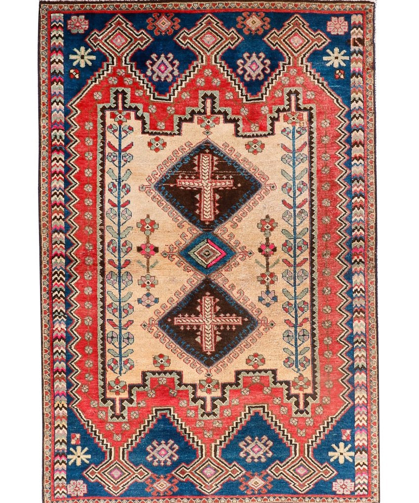 Persian Afshar rug with cream field, red and navy geometric medallion motifs