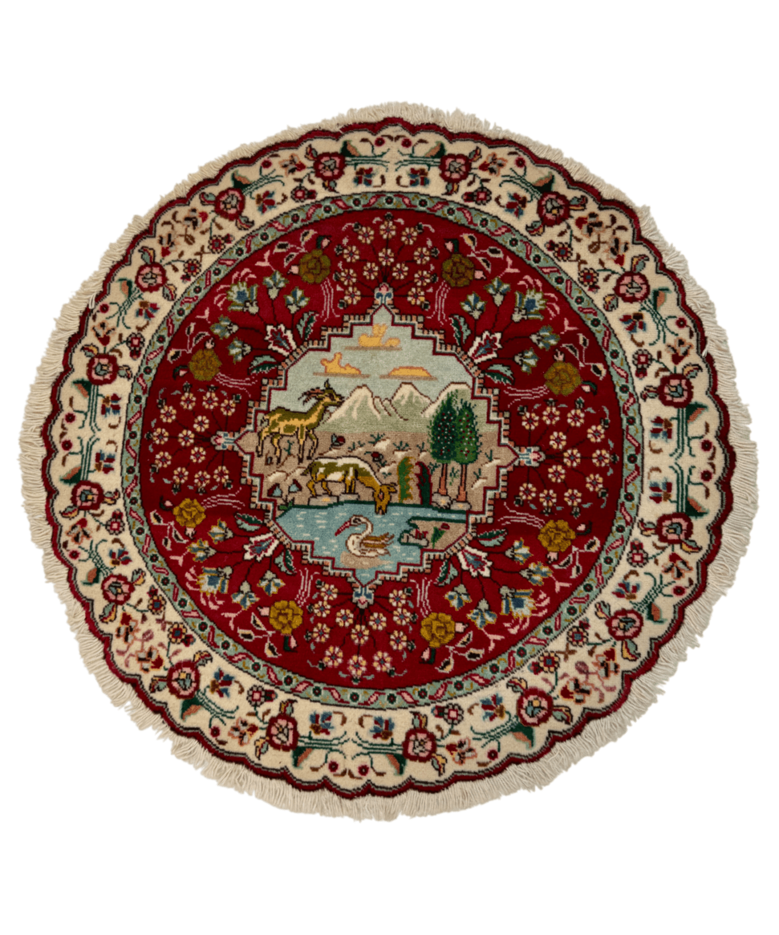 Round Persian Tabriz rug with central animal scene in red field, cream floral border.