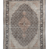 Square Persian-style area rug with light blue field, dark border, and central medallion.